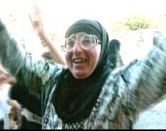Palestinian woman celebrates